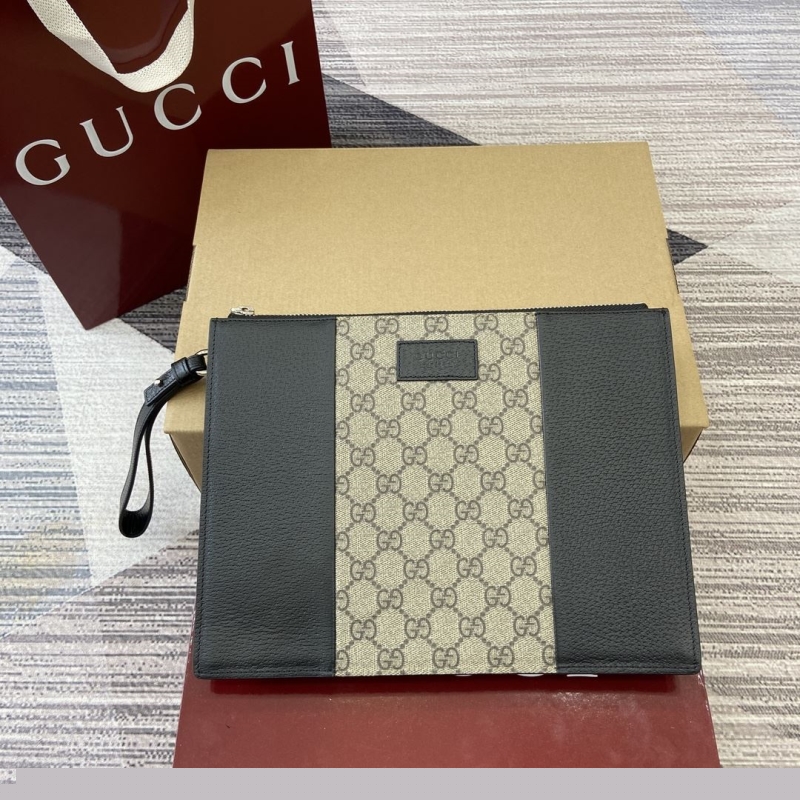 G*u*i clutch bags